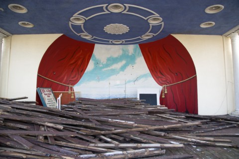 ENGLAND, West Sussex, Worthing, Piles of old decking in the bandstand the day that timber was