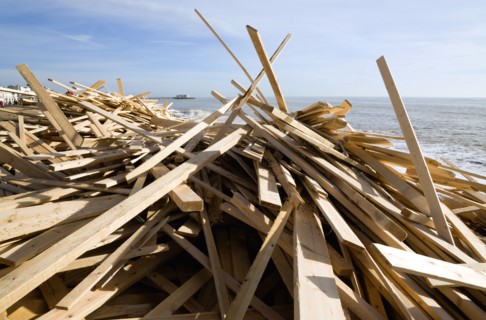 ENGLAND, West Sussex, Worthing, Timber washed up on the beach from the Greek registered Ice
