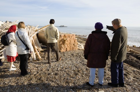 ENGLAND, West Sussex, Worthing, Timber washed up on the beach from the Greek registered Ice