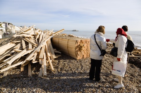 ENGLAND, West Sussex, Worthing, Timber washed up on the beach from the Greek registered Ice