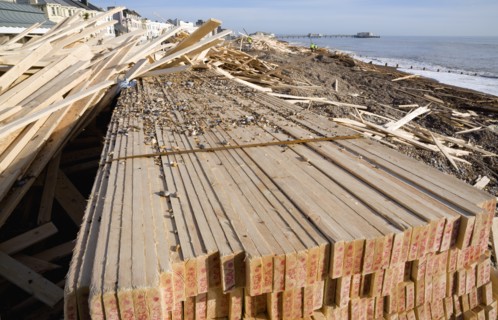 ENGLAND, West Sussex, Worthing, Timber washed up on the beach from the Greek registered Ice