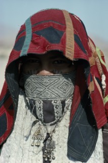 SUDAN, East, People, Head and shoulders portrait of Rasheida nomadic woman wearing embroidered and
