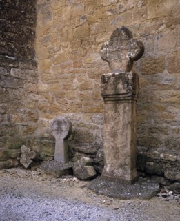 FRANCE, Languedoc-Roussillon, Aude, Montmaur.  Disc shaped crosses outside the Eglise St Baudile