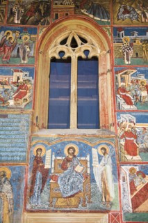 ROMANIA, Moldavia, Bucovina, "Frescoes on outside wall above entrance, Voronet Monastery, near Gura