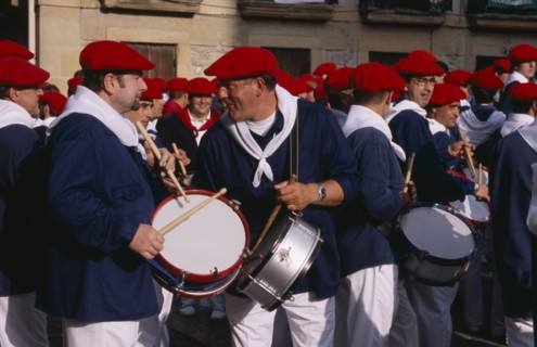 SPAIN, Pais Vasco, Hondarribia, Drummers at annual festival celebrating the defeat of the French