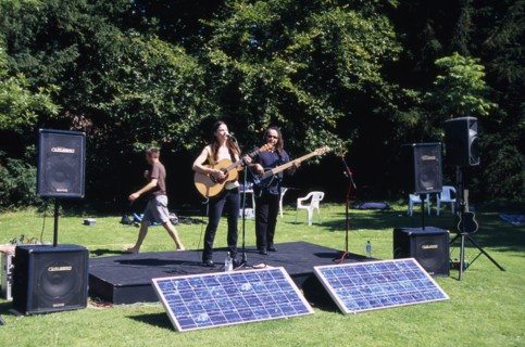 ENGLAND, East Sussex, Lewes, Guitar festival performers with solar powered amplifier systems.