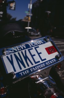 USA, New York, New York City, Detail of motorbike number plate YNKEE