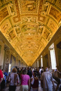 ITALY, Lazio, Rome, Vatican City Museum Tourists in the Gallery of Maps showing the illuminated