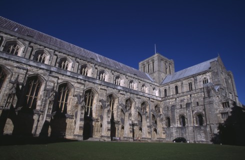 ENGLAND, Hampshire, Winchester, Winchester Cathedral. Part view seen from the Cathedral Close