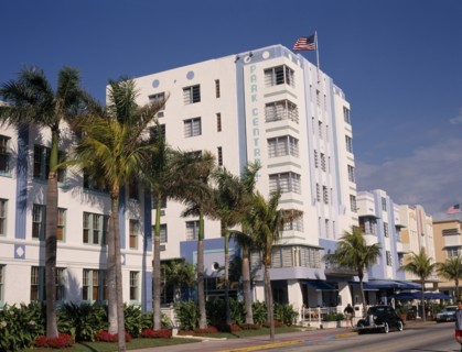 USA, Florida, Miami, South Beach. Ocean Drive. Park Central Hotel exterior lined with palm trees