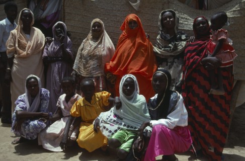 SUDAN, South Tokar, People, Beni Amer nomadic Arab extended family.  Note facial scarification of