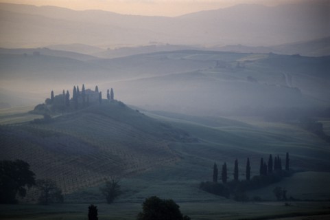 ITALY, Tuscany, San Quirico, View over The Belvedere in early morning mist