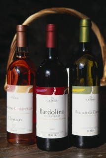 ITALY, Veneto, Lake Garda, "Bardolino.  Bottles of red, white and rose wine from the Bardolino