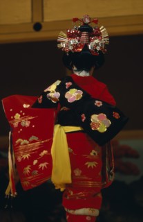 JAPAN, People, Children, "Young girl seen from behind, wearing traditional red embroidered kimono