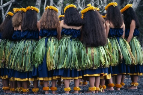 USA, Hawaii, Halemaumau Crater, "Group of dancers stand in circle with bowed heads beside the