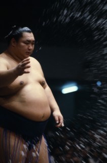JAPAN, Samurai, Sumo, Sumo wrestler throwing handfuls of salt into the ring as an act of