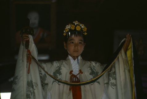 JAPAN, Kyushu, Kaseda Shrine, "Portrait of young shrine maiden employed to welcome visitors,