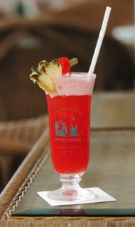SINGAPORE, Cocktail, "A SINGAPORE SLING COCKTAIL AT THE LONG BAR OF THE RAFFLES HOTEL WHERE THE