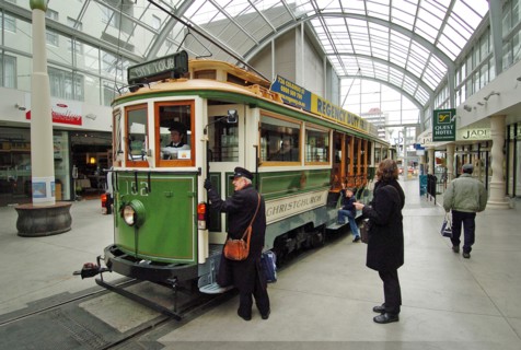 NEW ZEALAND, SOUTH ISLAND, CHRISTCHURCH, "CANTERBURY, CITY TOUR TRAMS AT A TRAM STOP IN WORCESTER