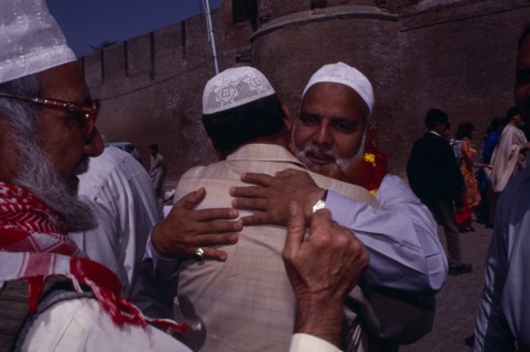 PAKISTAN, Punjab, Lahore, Devout Muslims saying their goodbyes before departing on pilgrimage to