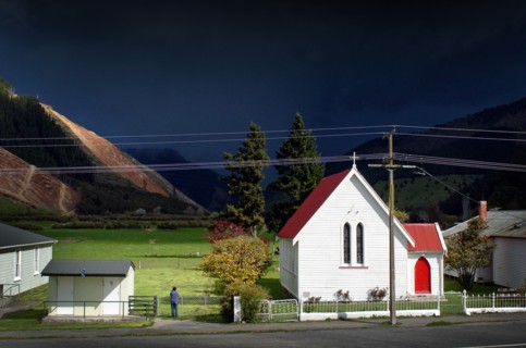 NEW ZEALAND, SOUTH ISLAND, CANVASTOWN, A STORM APPROACHES THE LOCAL CHURCH AT CANVASTOWN VIEWED