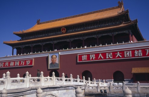 CHINA, Beijing, Entrance gateway to the Forbidden City from Tiananmen Square with portrait of Mao