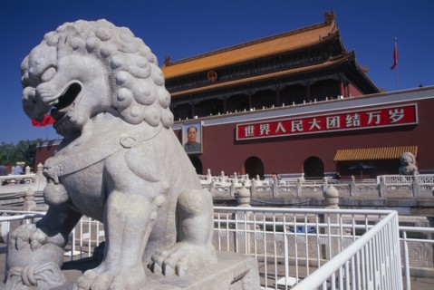 CHINA, Beijing, Entrance gateway to the Forbidden City from Tiananmen Square with portrait of Mao
