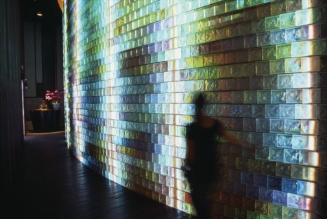 CHINA, Shanghai, Iridescent tiled entrance to the Liuli China Museum near Xintiandi with figure of
