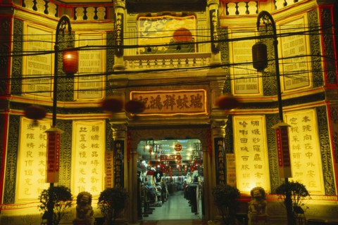 CHINA, Beijing, "Silk Emporium on Dazhalan Jie, exterior facade illuminated at night with open