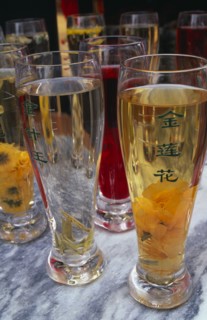 CHINA, Beijing, Selection of teas in tall glasses.