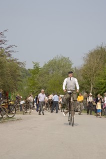 ENGLAND, West Sussex, Amberley, Amberley Working Museum. Veteran Cycle Day Grand Parade. Man