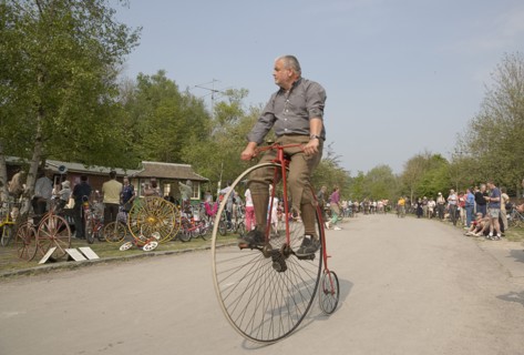 ENGLAND, West Sussex, Amberley, Amberley Working Museum. Veteran Cycle Day Grand Parade. Man