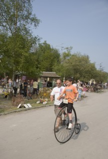ENGLAND, West Sussex, Amberley, Amberley Working Museum. Veteran Cycle Day Grand Parade. Young Boy