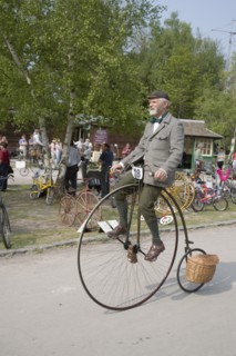 ENGLAND, West Sussex, Amberley, Amberley Working Museum. Veteran Cycle Day Grand Parade. Young boy