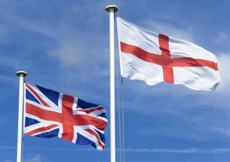ENGLAND, West Sussex, Littlehampton, Flagpoles with the English flag of Saint George on the right