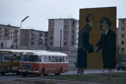 MONGOLIA, Ulan Bator, Soviet billboard in central Ulan Bator  depicting Lenin shaking hands with