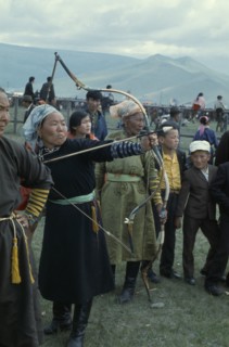 MONGOLIA, Ulan Bator, Nadam  National Day Ulan Bator Stadium Woman competitor taking part in