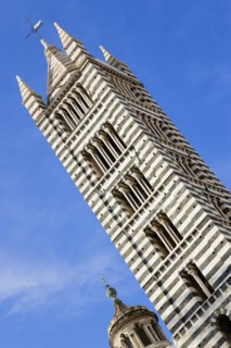 ITALY, Tuscany, Siena, The belltower of the Gothic Duomo or Cathedral of Santa Maria Assunta made