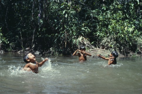 COLOMBIA, North West Amazon, Tukano Indigenous People, Three young Makuna children playing in water