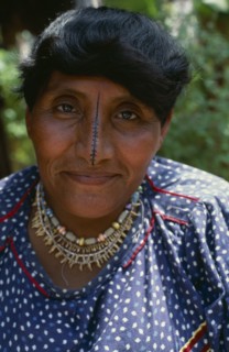 PANAMA, San Blas Islands, Kuna Indians, Portrait of  wife of Kuna headman traditional black stripe