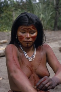 COLOMBIA, North West Amazon, Tukano Indigenous People, Young Barasana mother using cumare fibre