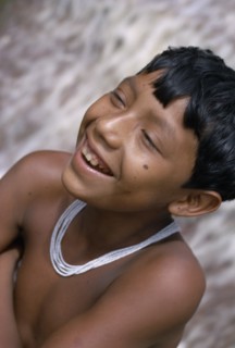 COLOMBIA, North West Amazon, Tukano Indigenous People, Head and shoulders portrait of laughing