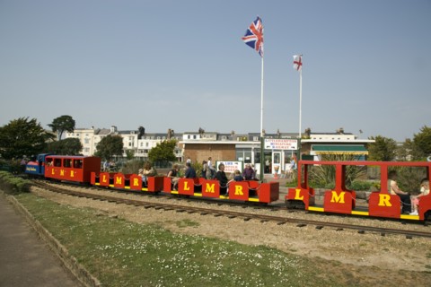 ENGLAND, West Sussex, Littlehampton, Families enjoying the Miniature Railway train ride at Norfolk