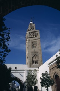 MOROCCO, Casablanca, Main Mosque in Habbous District. Minaret seen from under an arch