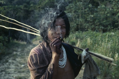 COLOMBIA, North West Amazon, Tukano Indigenous People, Barasana Indian smoking home grown tobacco