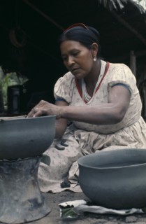 COLOMBIA, North West Amazon, Tukano Indigenous People, Barasana woman Paulina making clay cooking