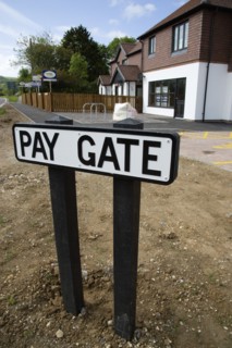 ENGLAND, West Sussex, Washington, To Let signs on wooden fencing outside a newly built housing