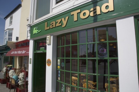 ENGLAND, West Sussex, Shoreham-by-Sea, The Lazy Toad public house in the high street.