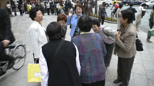 JAPAN, Honshu, Tokyo, "Ginza - group of middle-aged women saying goodbye, well dressed, courtesy