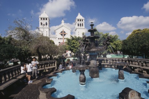 EL SALVADOR, Juayua, Temple del Senor de Juayua and Plaza.  Children beside fountain in foreground